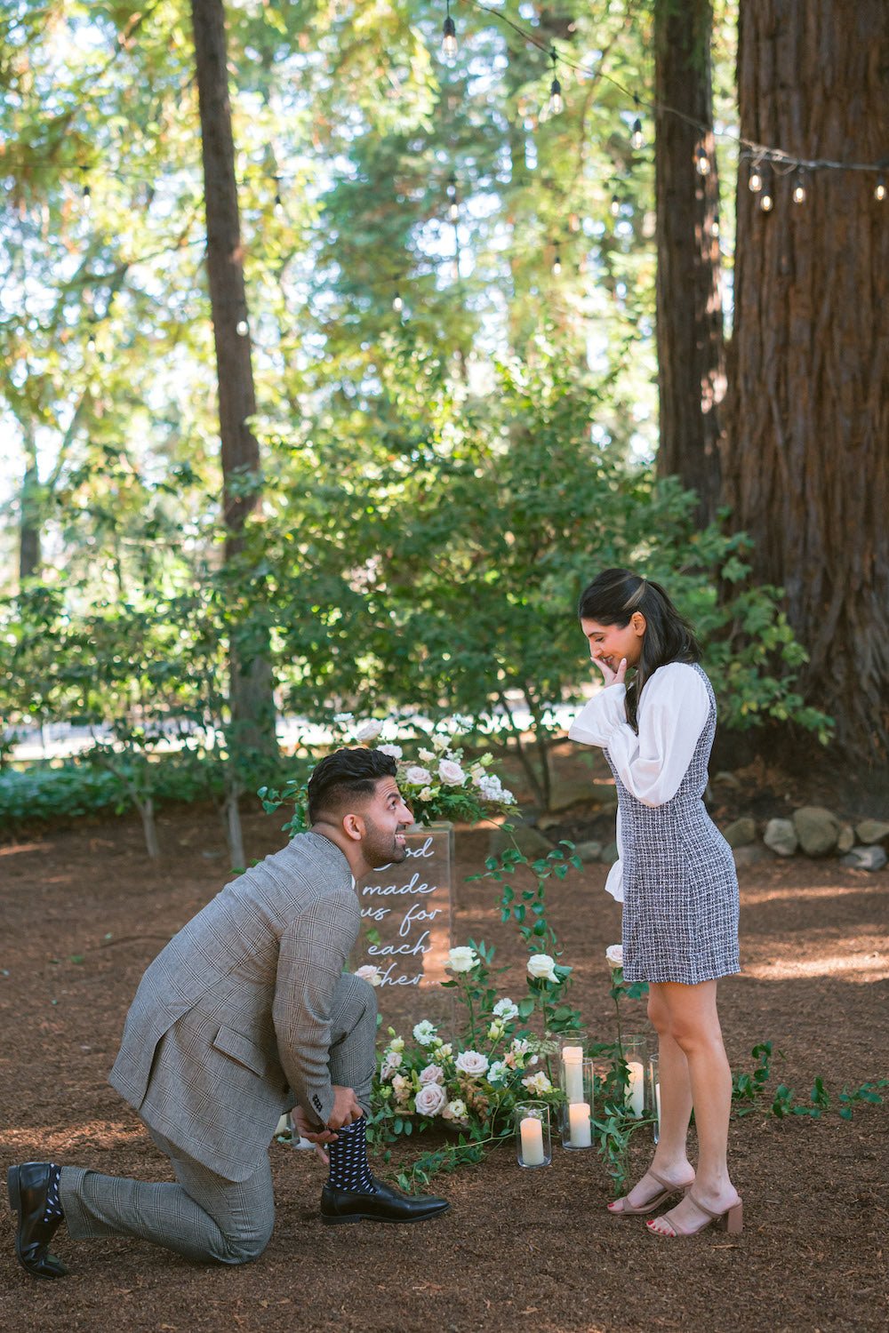 Man proposing to girlfriend wearing DIAMONDS ROCK Proposal Socks and thin ring Box 