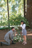 Man proposing to girlfriend wearing DIAMONDS ROCK Proposal Socks and thin ring Box 